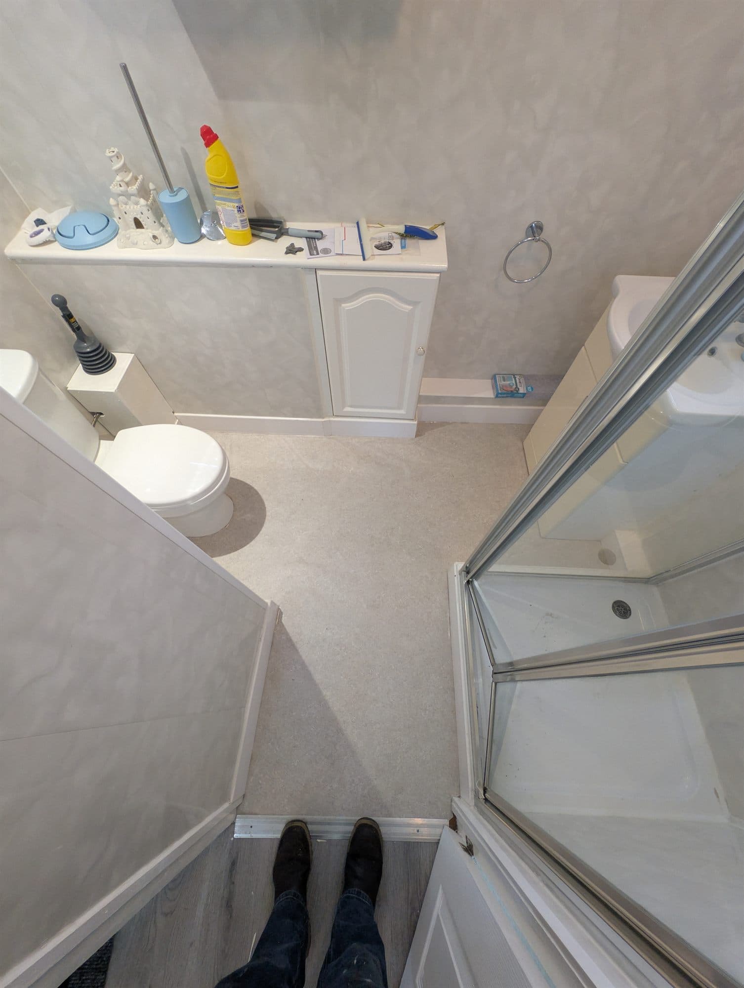 Same bathroom with a new light-coloured floor laid