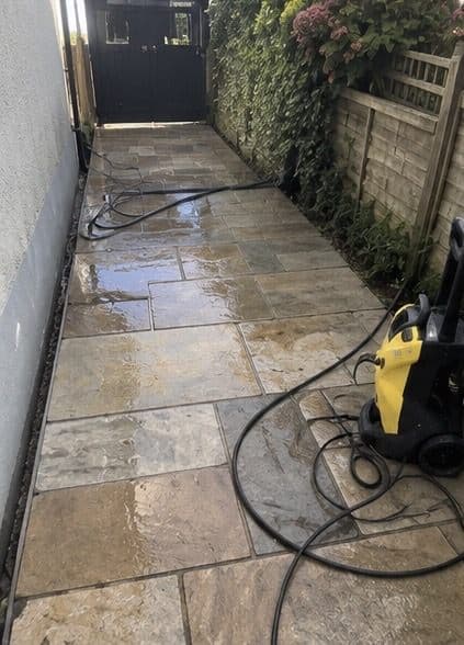 Stone slab side path freshly pressure washed